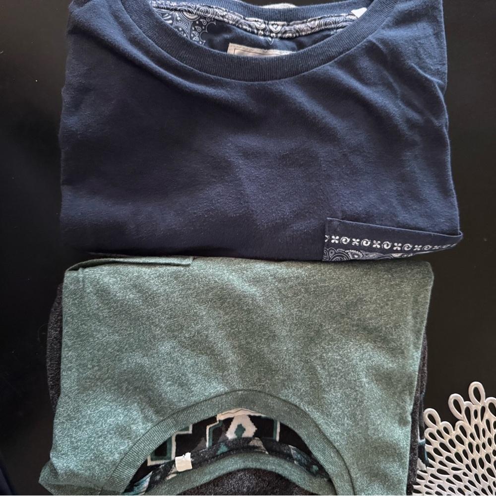 On the Byas Black and Teal Geometric Design